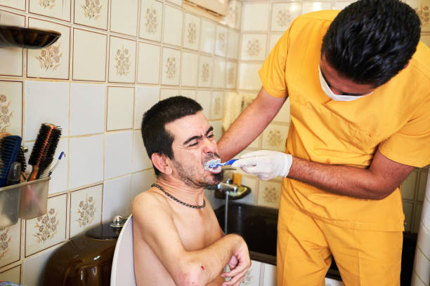 Can a Home Caregiver Help an Adult With Disabilities With Bathing, Dressing, and Toileting?